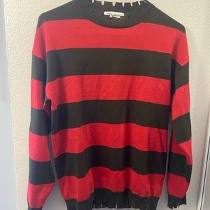 Red striped “Freddy Krueger” -esque sweater